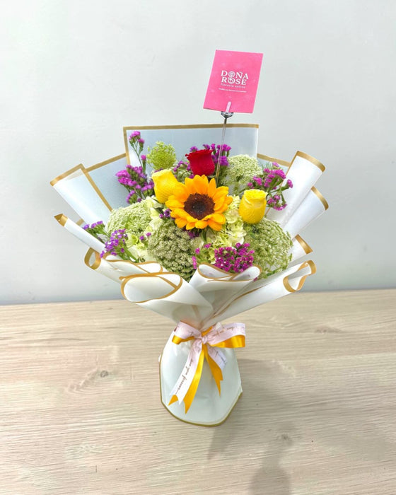 Ramo de Rosas y Girasol “Amor Dorado”