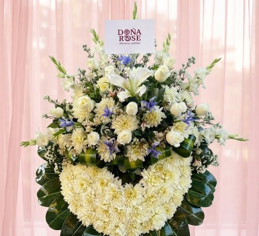 Corona Funebre con rosas rojas e iris “Último Adiós”